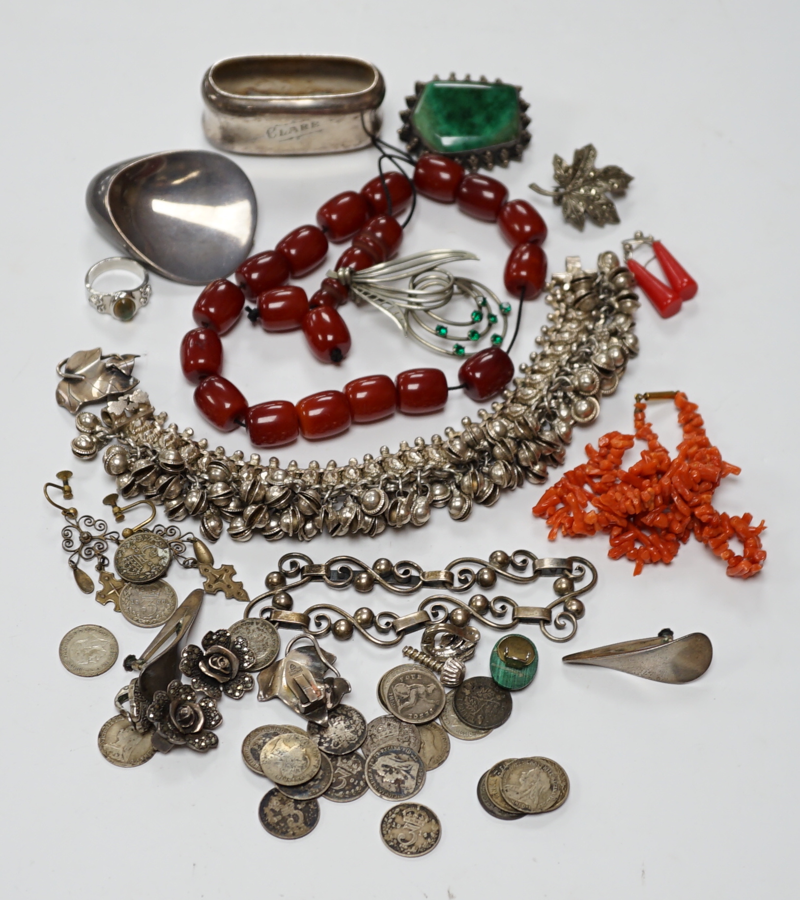 A quantity of assorted jewellery including costume, a pair of Danish sterling ear clips, a 1960's Nanna & Jorgen Ditzel for Georg Jensen sterling silver brooch, no.328, 51mm, a pair of Georg Jensen sterling ear clips, no